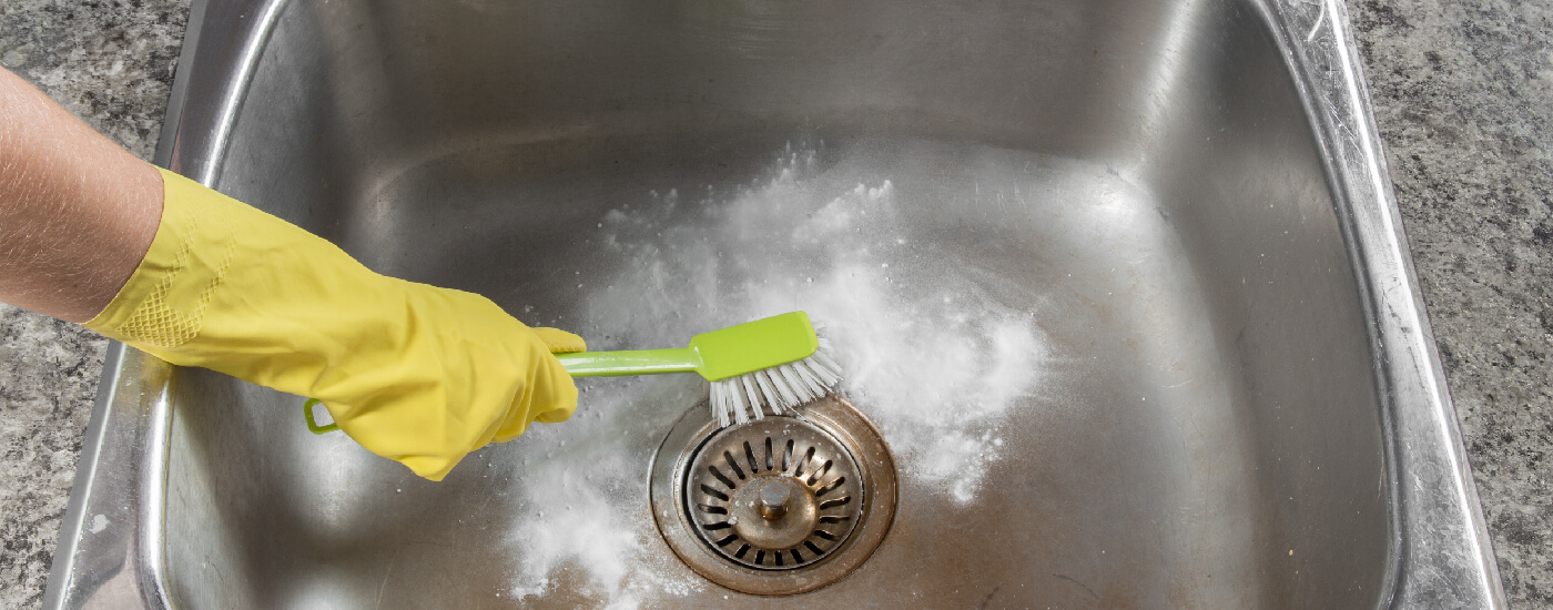 cleaning out kitchen sink drain